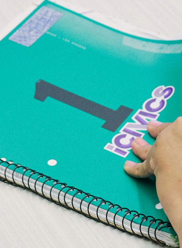 spiral notebook with iCivics sticker on front